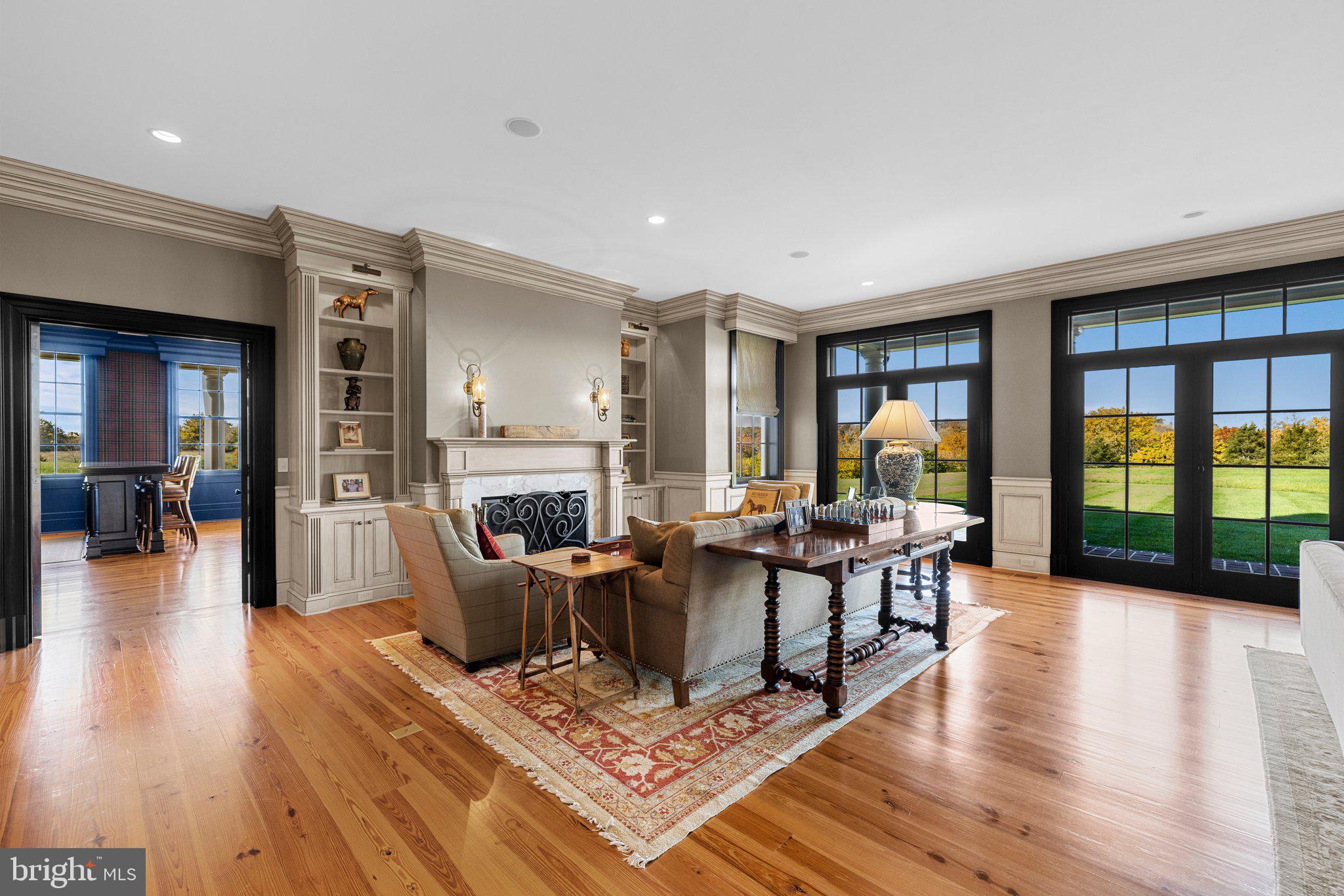 1077 Ginns Road Boyce, VA 22620 - Photo 16 of 140 a view of a dining room with furniture window and wooden floor