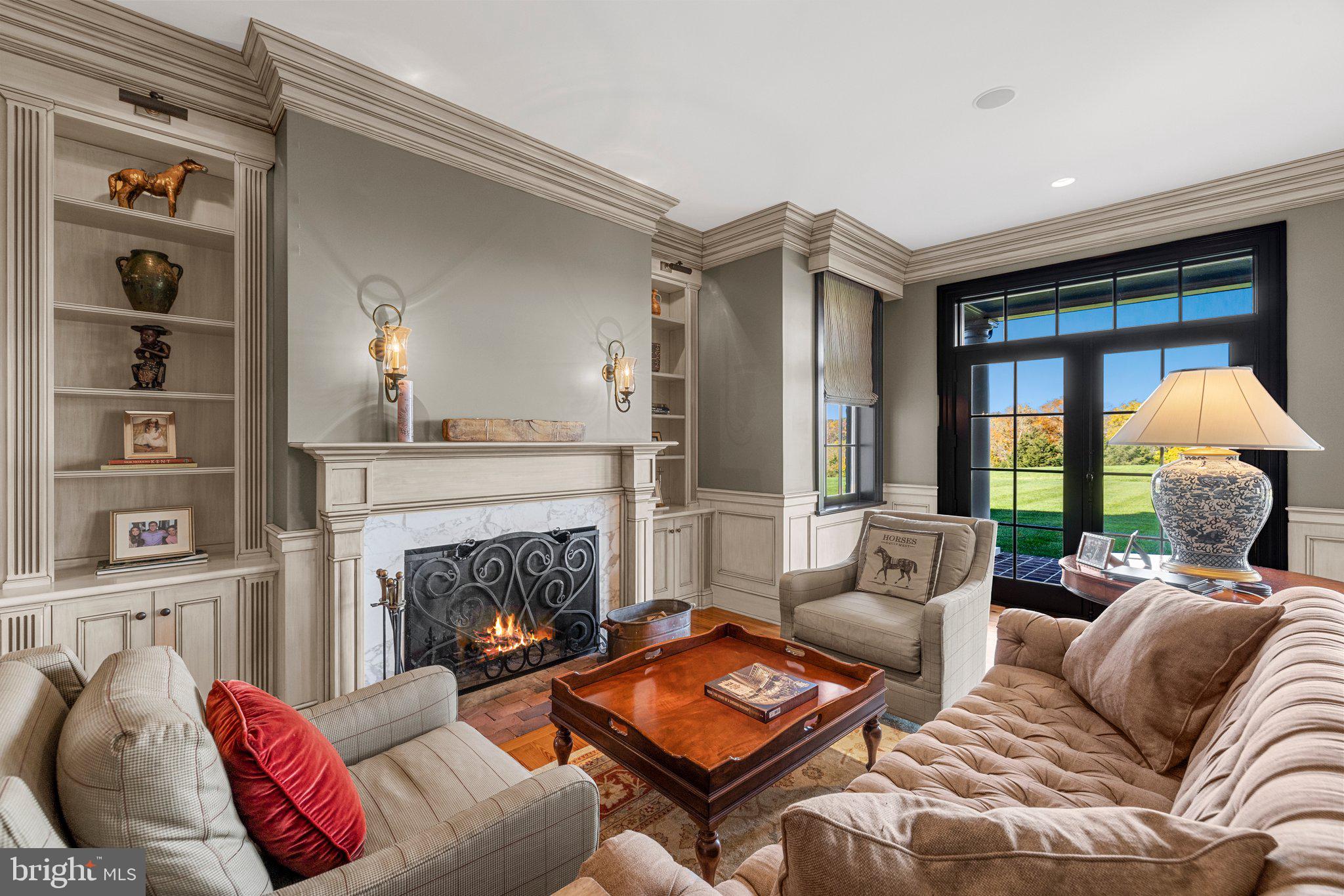 1077 Ginns Road Boyce, VA 22620 - Photo 17 of 140 a living room with furniture fireplace and a large window