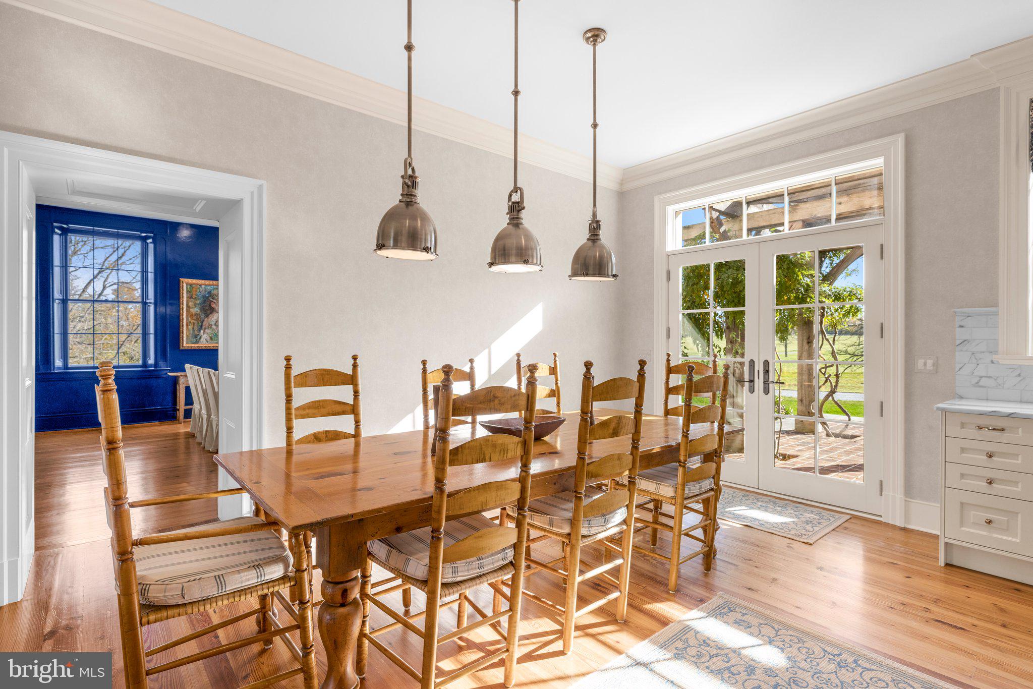 1077 Ginns Road Boyce, VA 22620 - Photo 29 of 140 a view of a dining room with furniture window and wooden floor