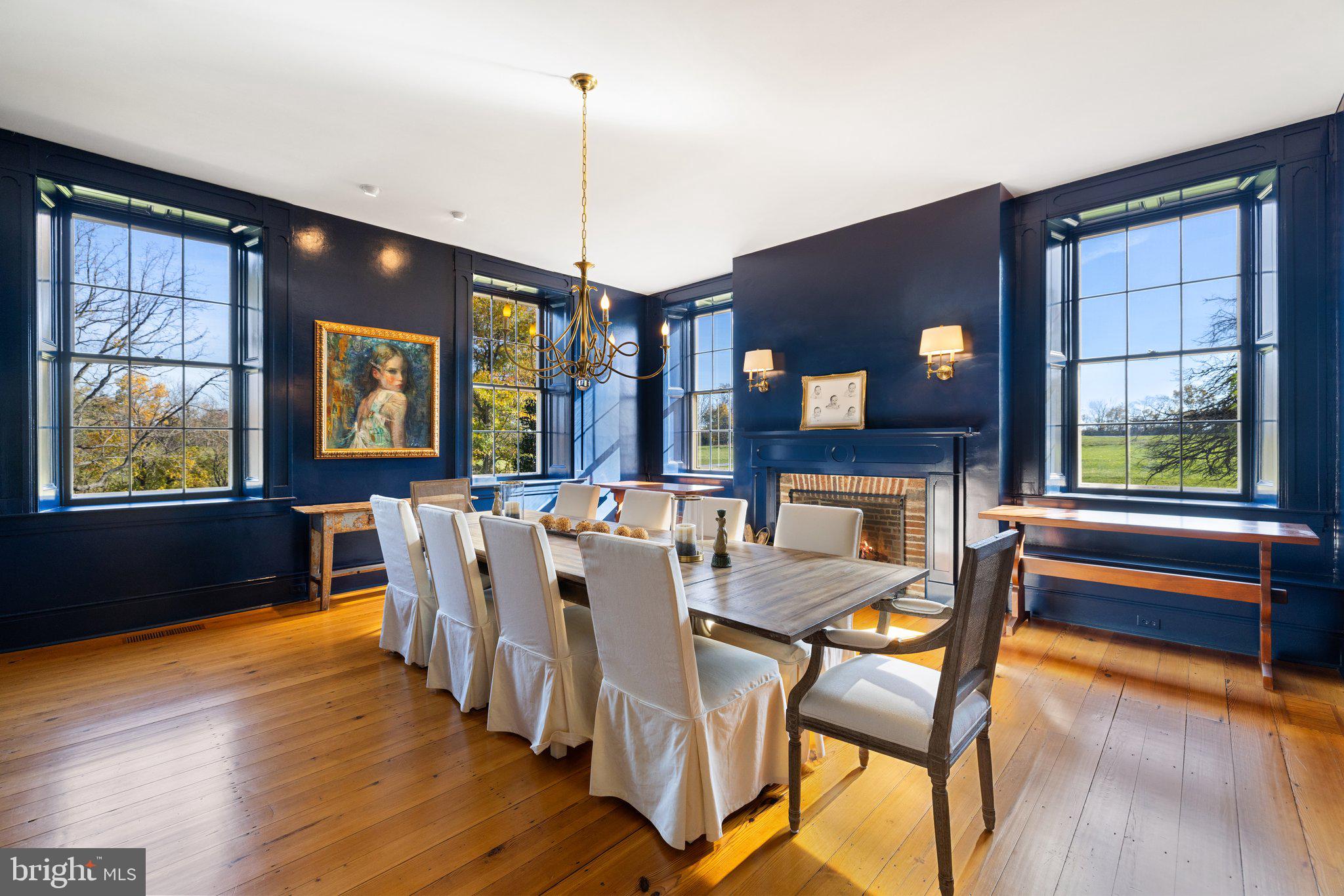 1077 Ginns Road Boyce, VA 22620 - Photo 31 of 140 a view of a dining room with furniture window and wooden floor
