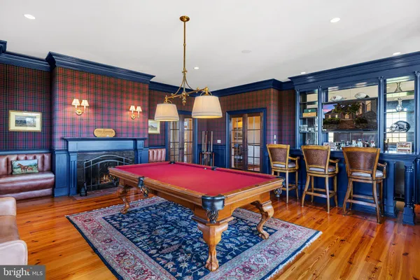 a spacious bedroom with a bed and a table