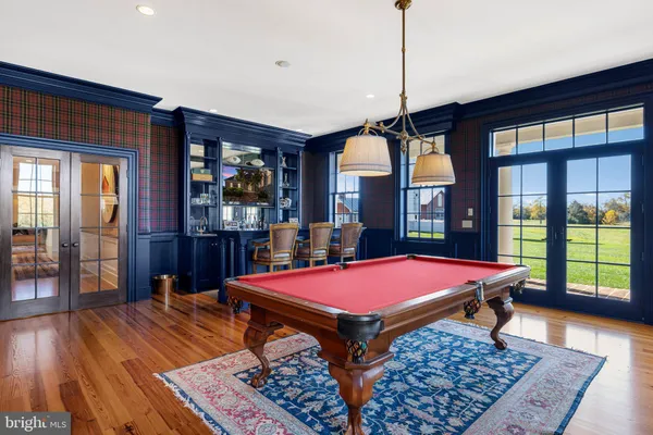 a bathroom with a sink vanity and mirror