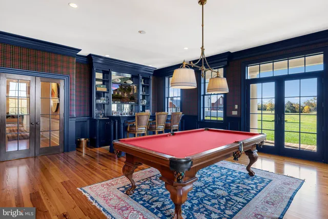 a bathroom with a sink vanity and mirror