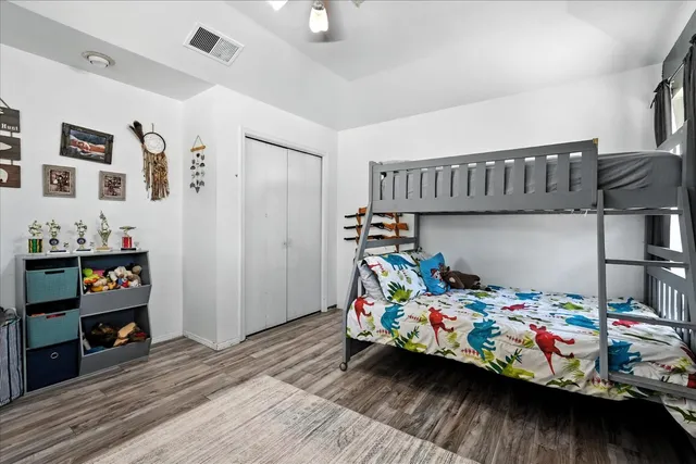 an aerial view of a house with a swimming pool