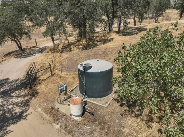 a view of a road with yard