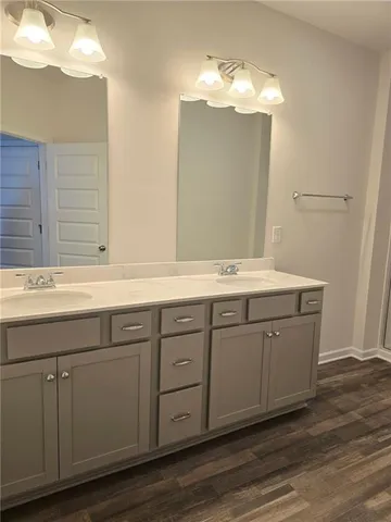 a bathroom with a bathtub and shower