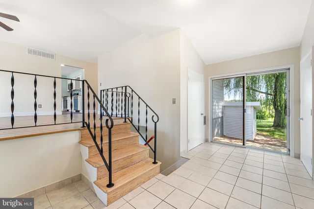a view of a hallway with staircase