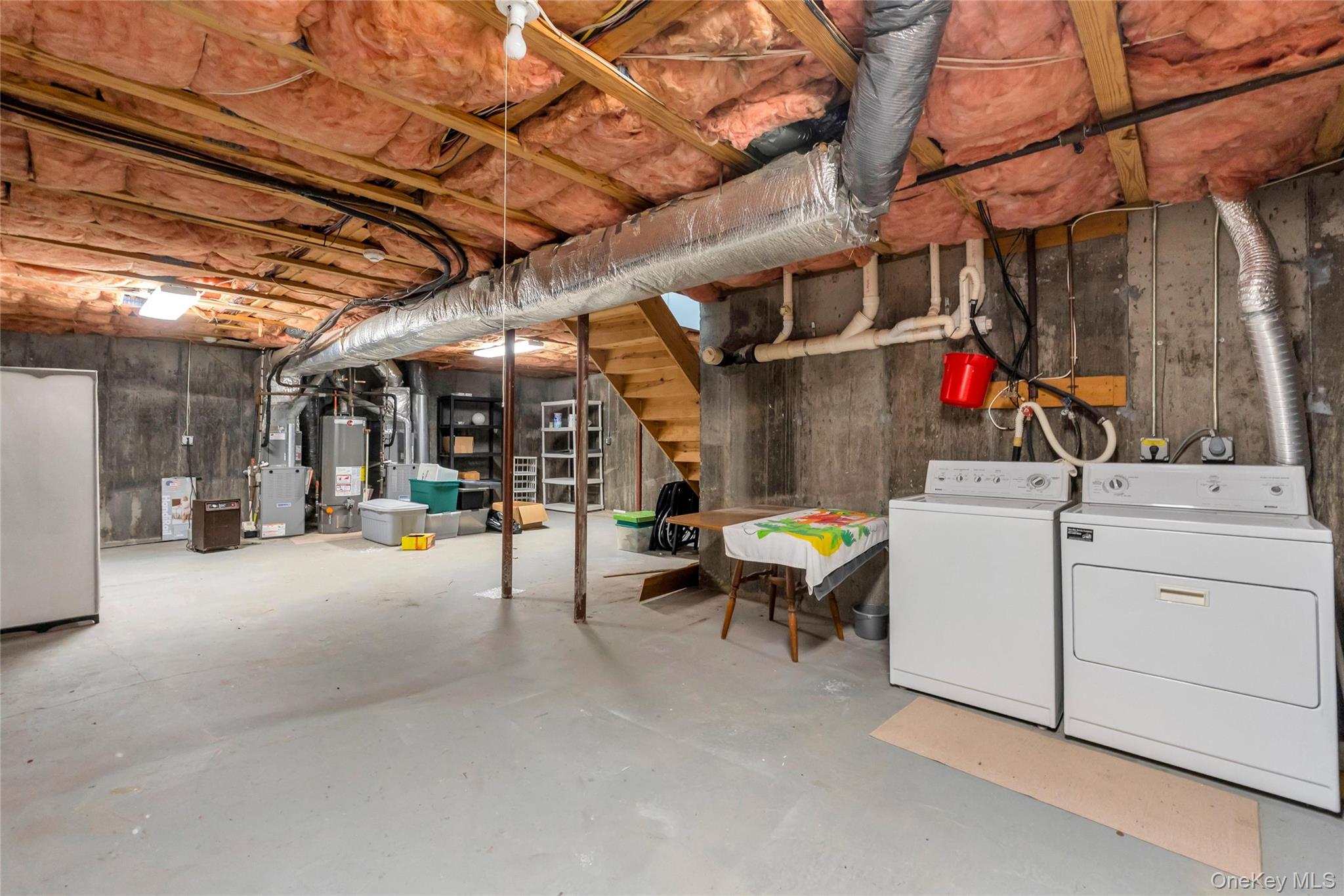 22 Kettle Hole Road Manorville, NY 11949 - Photo 31 of 39 Washer and dryer in basement