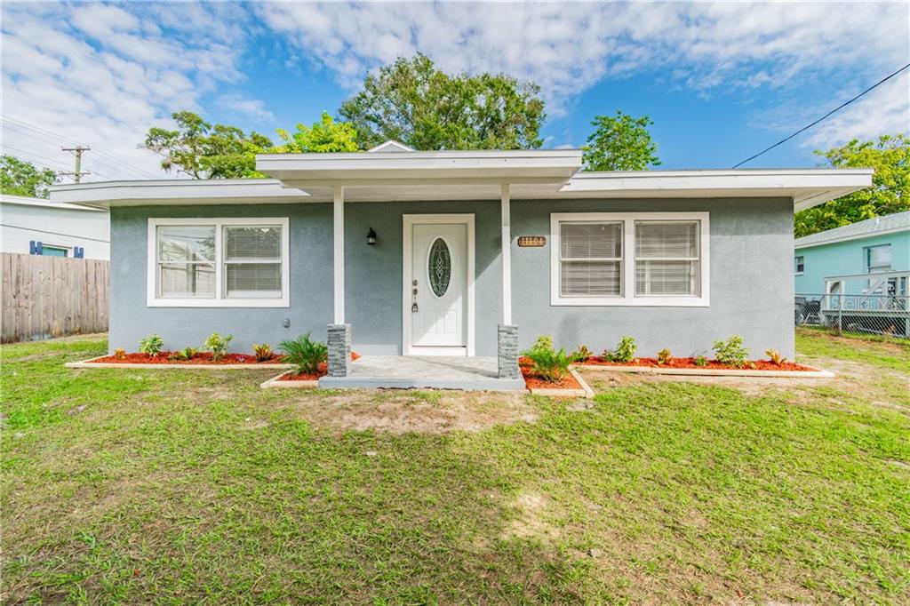 11104 Hackney Drive Riverview, FL 33578 - Photo 1 of 1 front view of a house with a yard