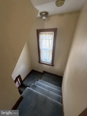 a view of livingroom with furniture and window
