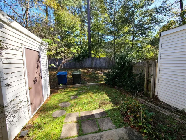 a view of swimming pool with a backyard