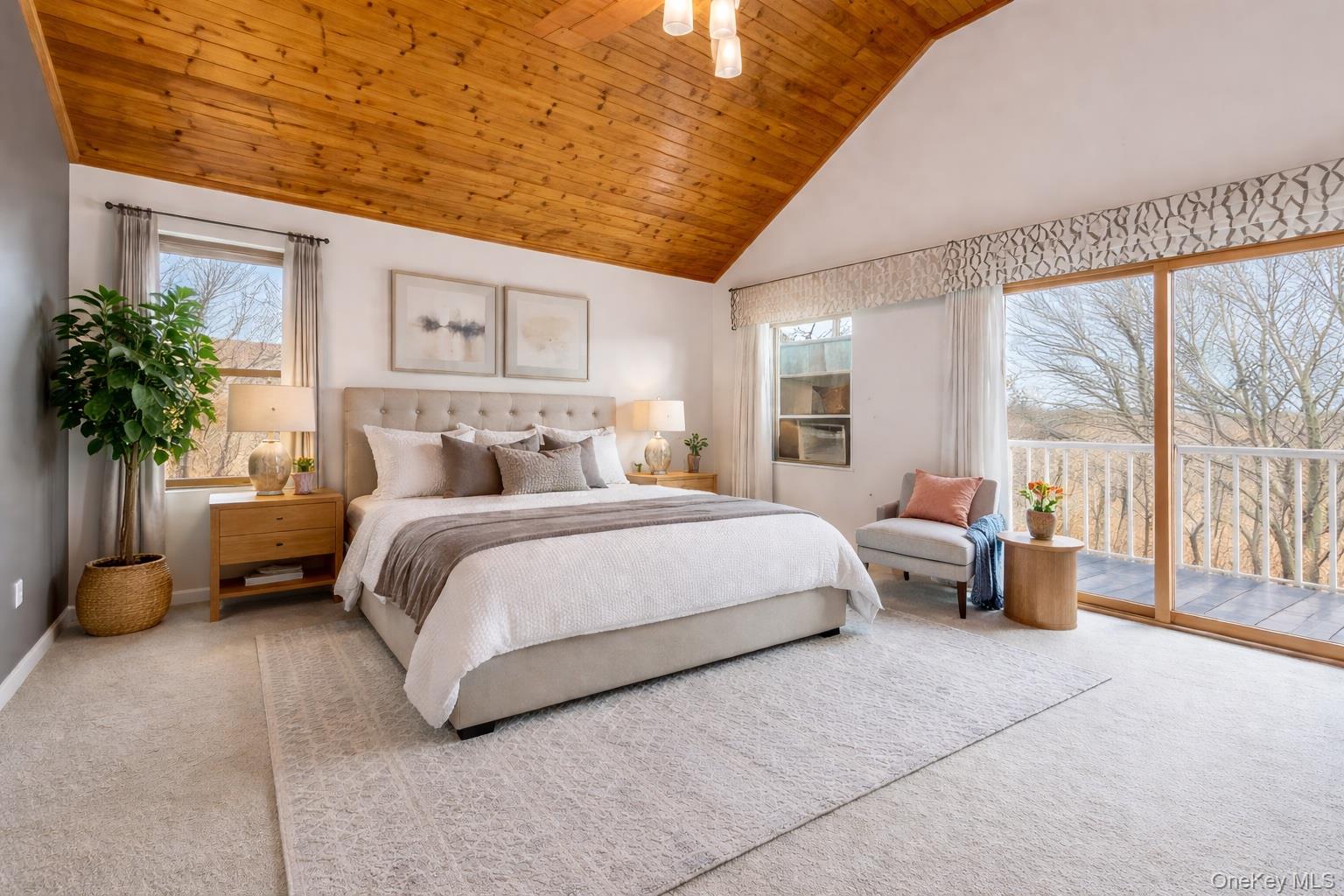 27 Krieger Road Fort Montgomery, NY 10922 - Photo 11 of 24 a bed room with a bed and a couch