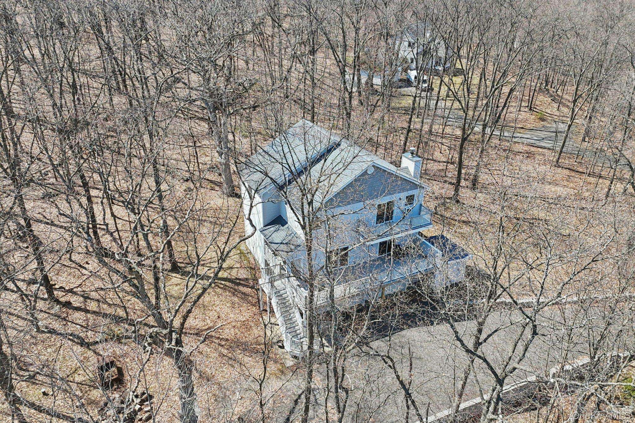27 Krieger Road Fort Montgomery, NY 10922 - Photo 21 of 24 view of a house with a yard
