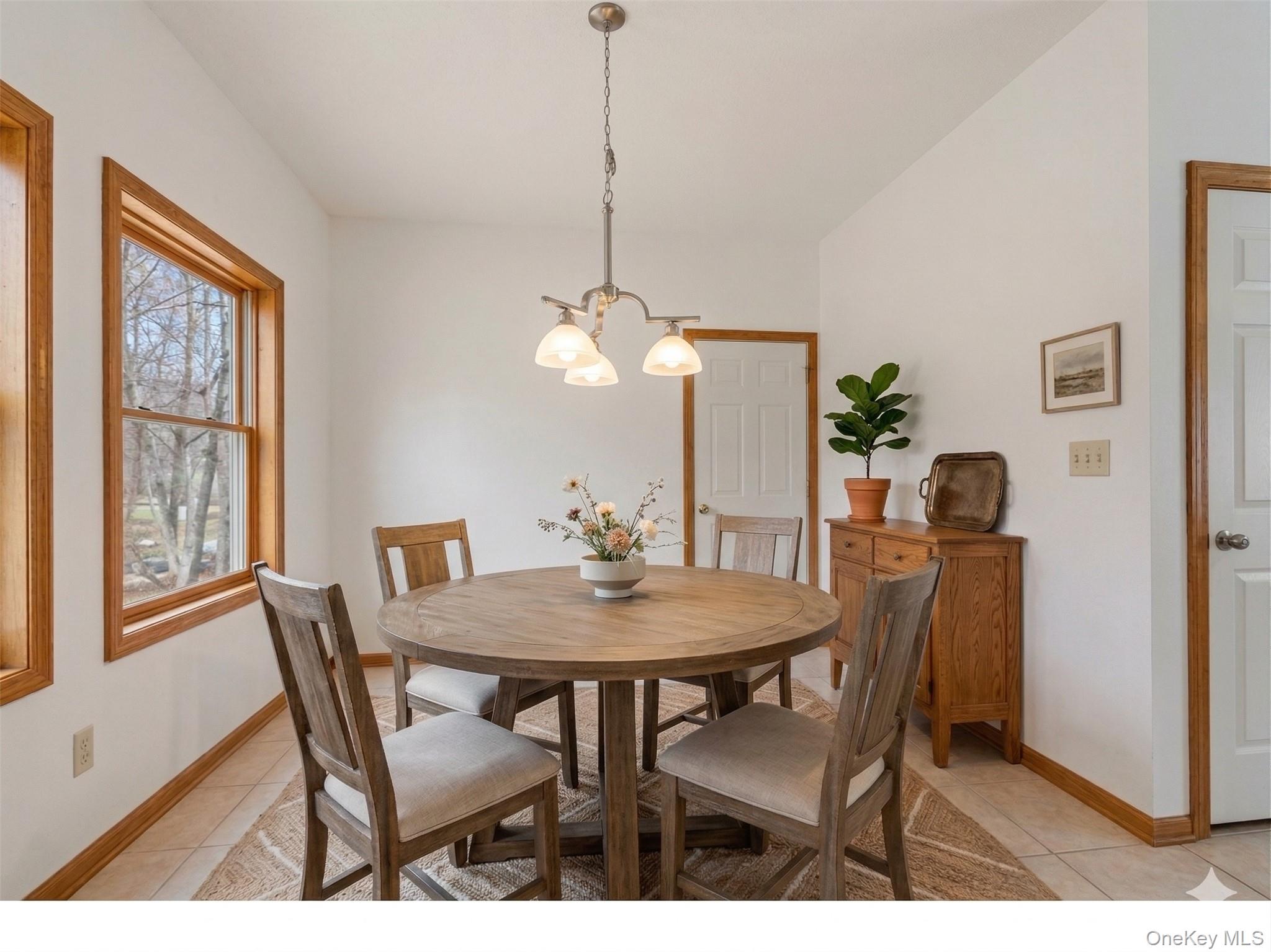 27 Krieger Road Fort Montgomery, NY 10922 - Photo 7 of 24 a view of a dining room with furniture window and wooden floor