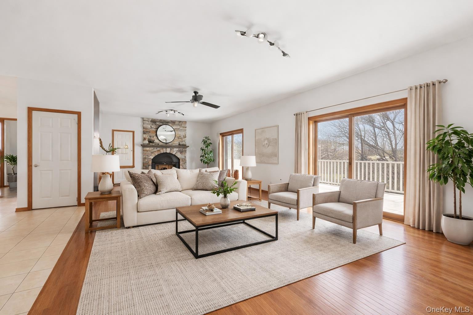 27 Krieger Road Fort Montgomery, NY 10922 - Photo 9 of 24 a living room with furniture and a large window