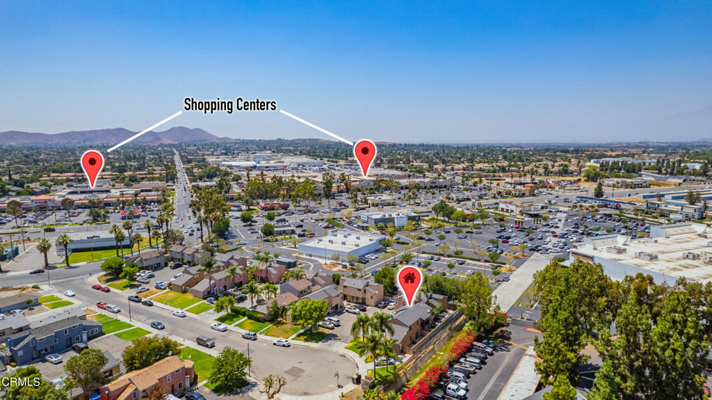 9039 Colony Place Riverside, CA 92503 - Photo 13 of 15 a street view with tall buildings