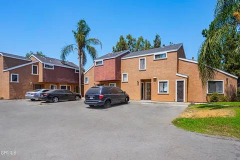 a view of a car in front of a house