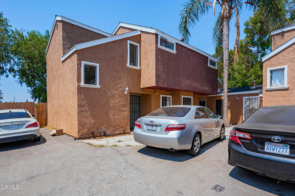9039 Colony Place Riverside, CA 92503 - Photo 7 of 15 a front view of a house with a garden