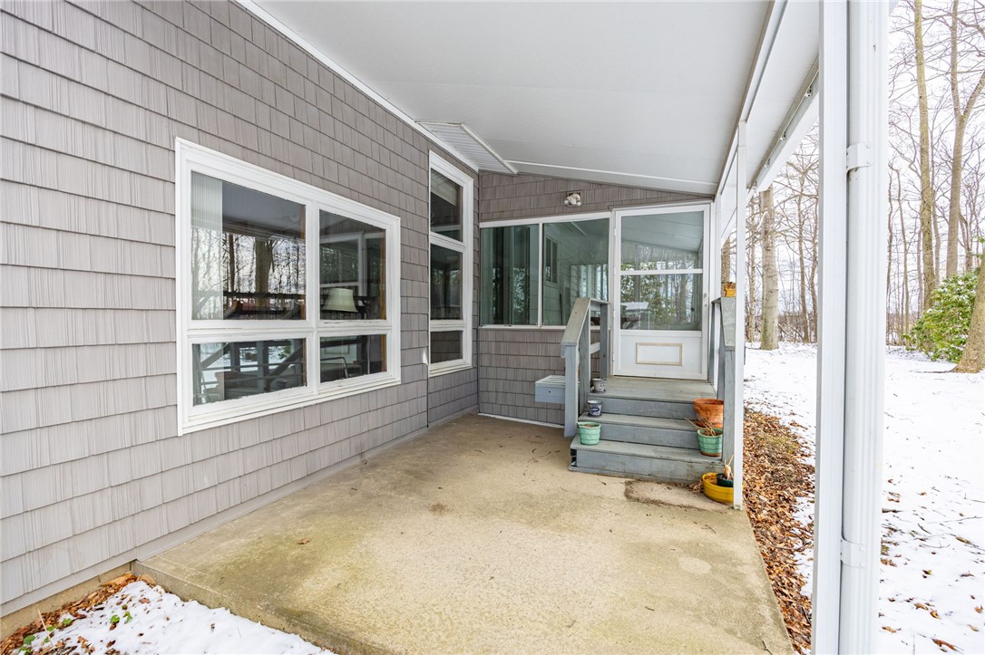 2327 Gorham Road Seneca, NY 14561 - Photo 43 of 48 Exterior access to three season room plus a sizabl