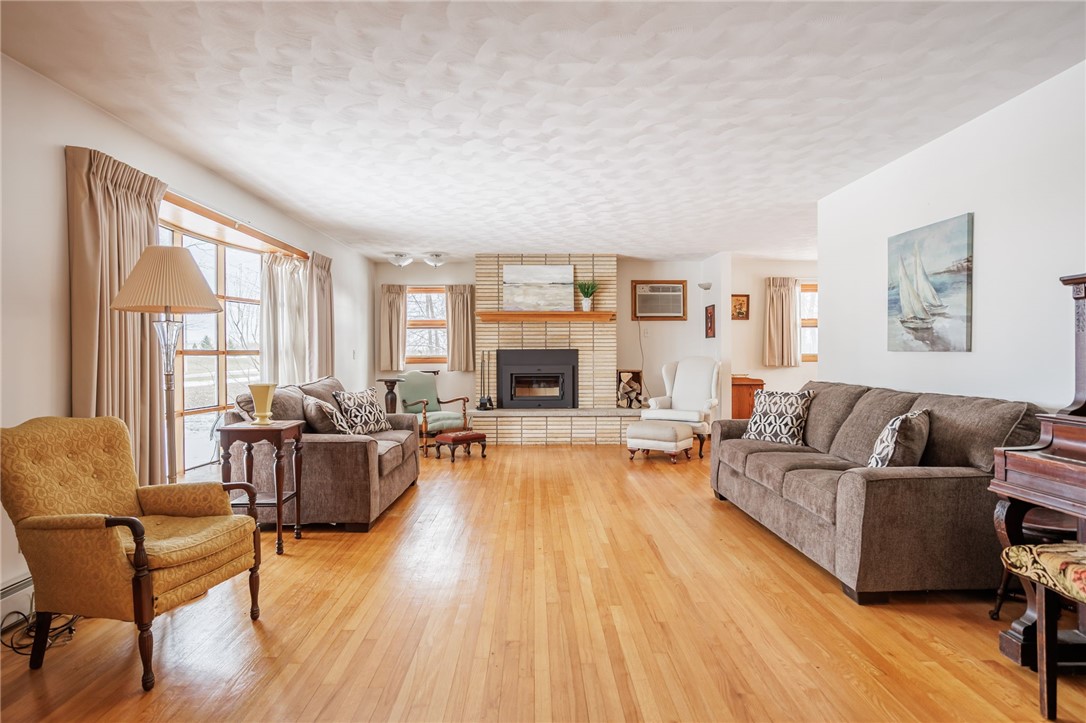 2327 Gorham Road Seneca, NY 14561 - Photo 7 of 48 Formal living room with wood burning fireplace