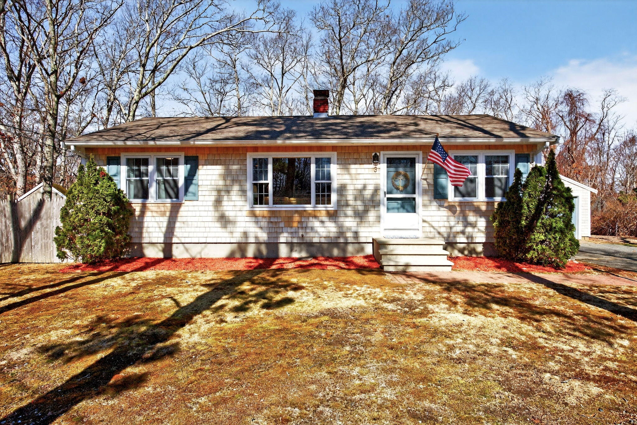 3 Januit Street Sandwich, MA 02563 - Photo 1 of 32 a front view of a house with a yard