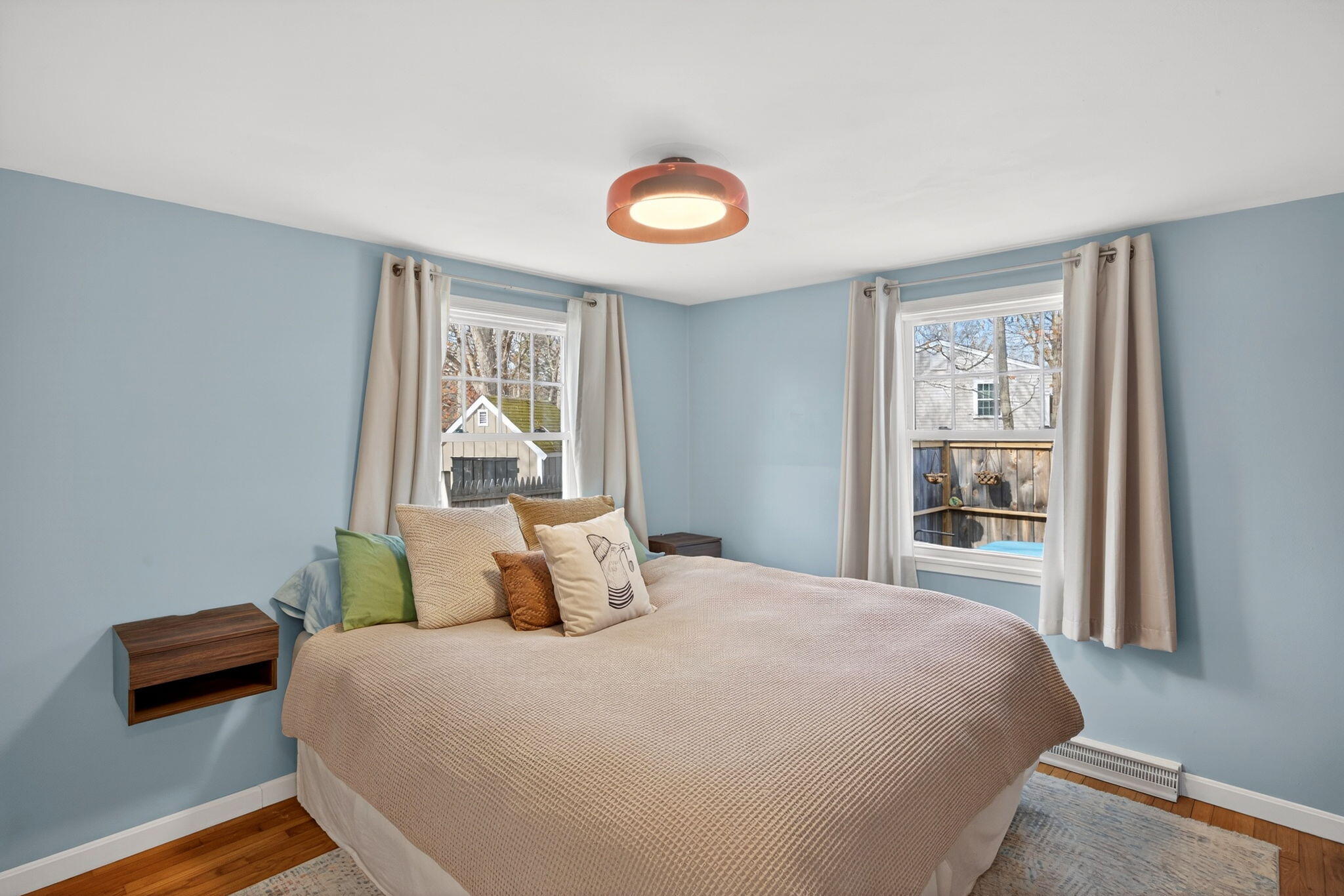 3 Januit Street Sandwich, MA 02563 - Photo 13 of 32 a bedroom with a bed and a window