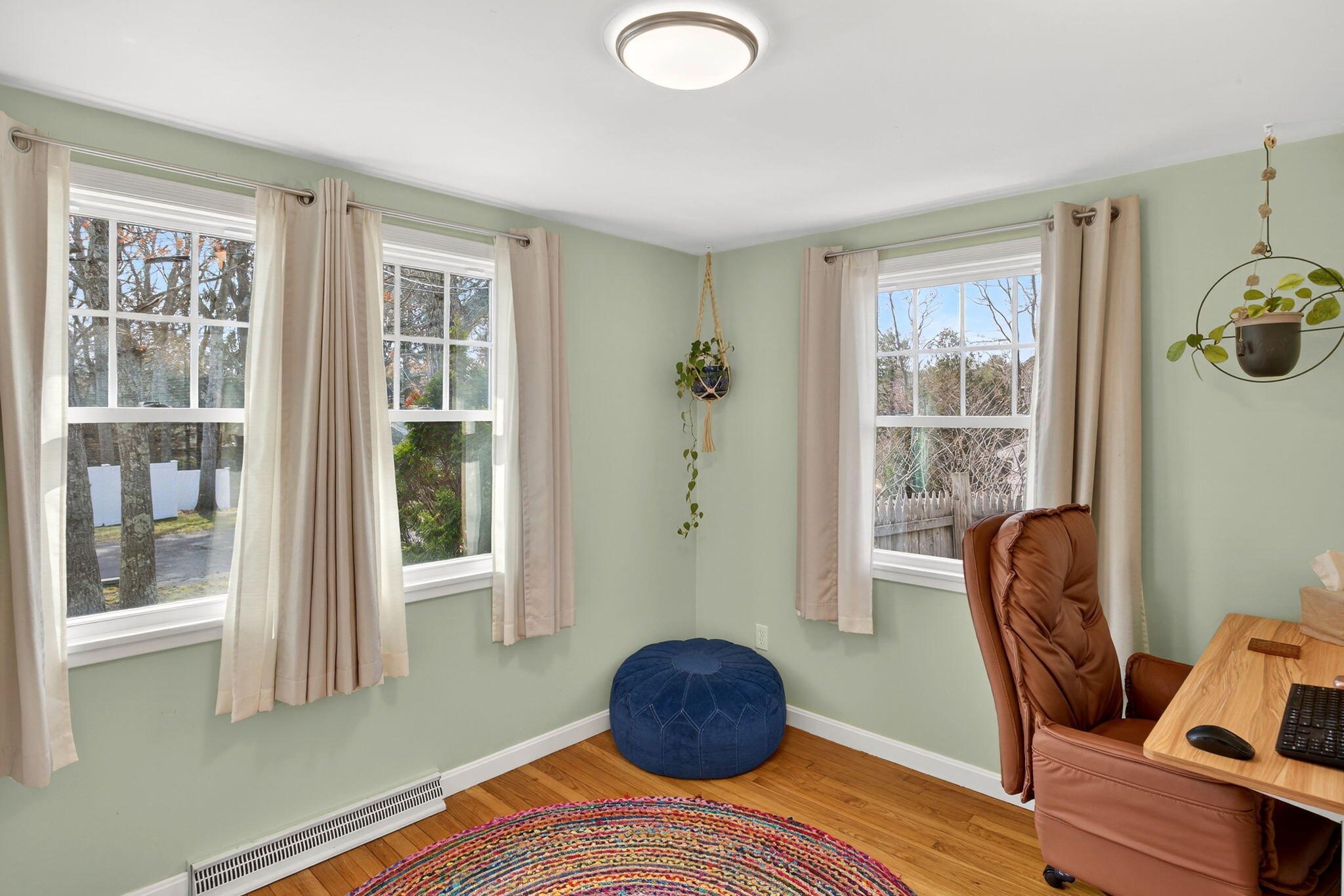 3 Januit Street Sandwich, MA 02563 - Photo 20 of 32 a bedroom with a bed and a window