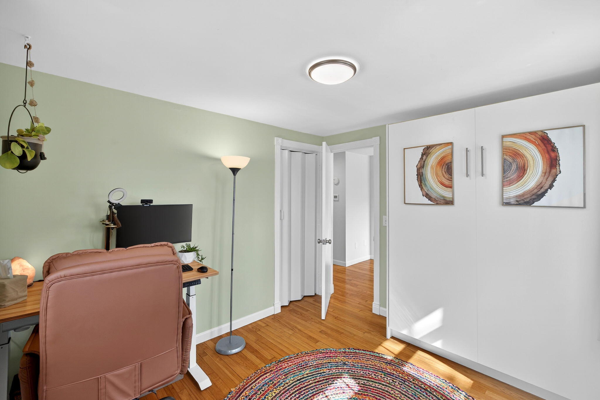3 Januit Street Sandwich, MA 02563 - Photo 21 of 32 a bedroom with a bed and cabinets