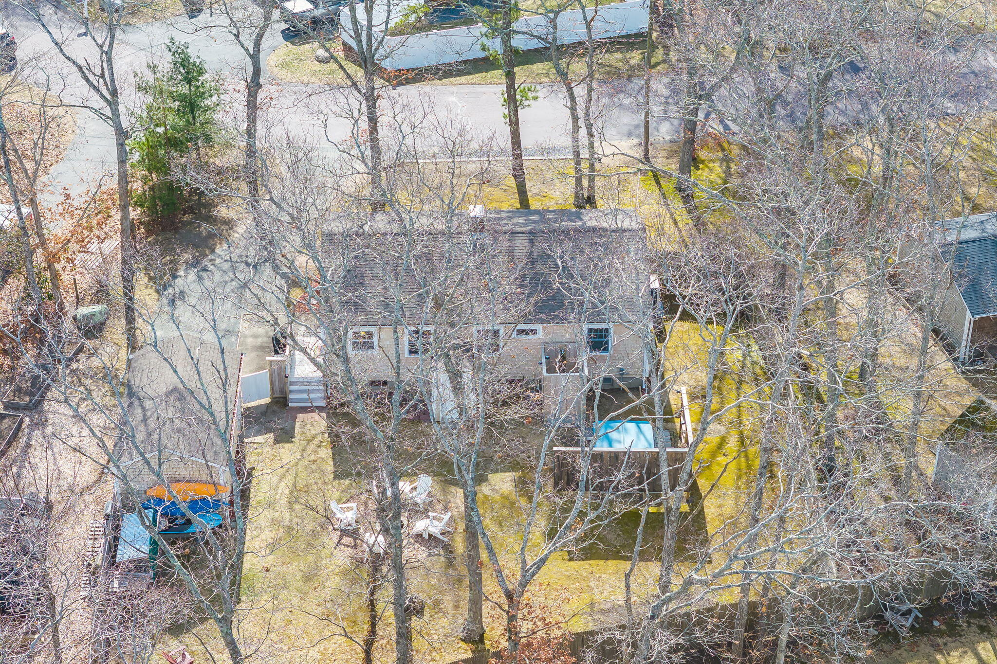 3 Januit Street Sandwich, MA 02563 - Photo 29 of 32 a aerial view of a house with a yard and sitting area