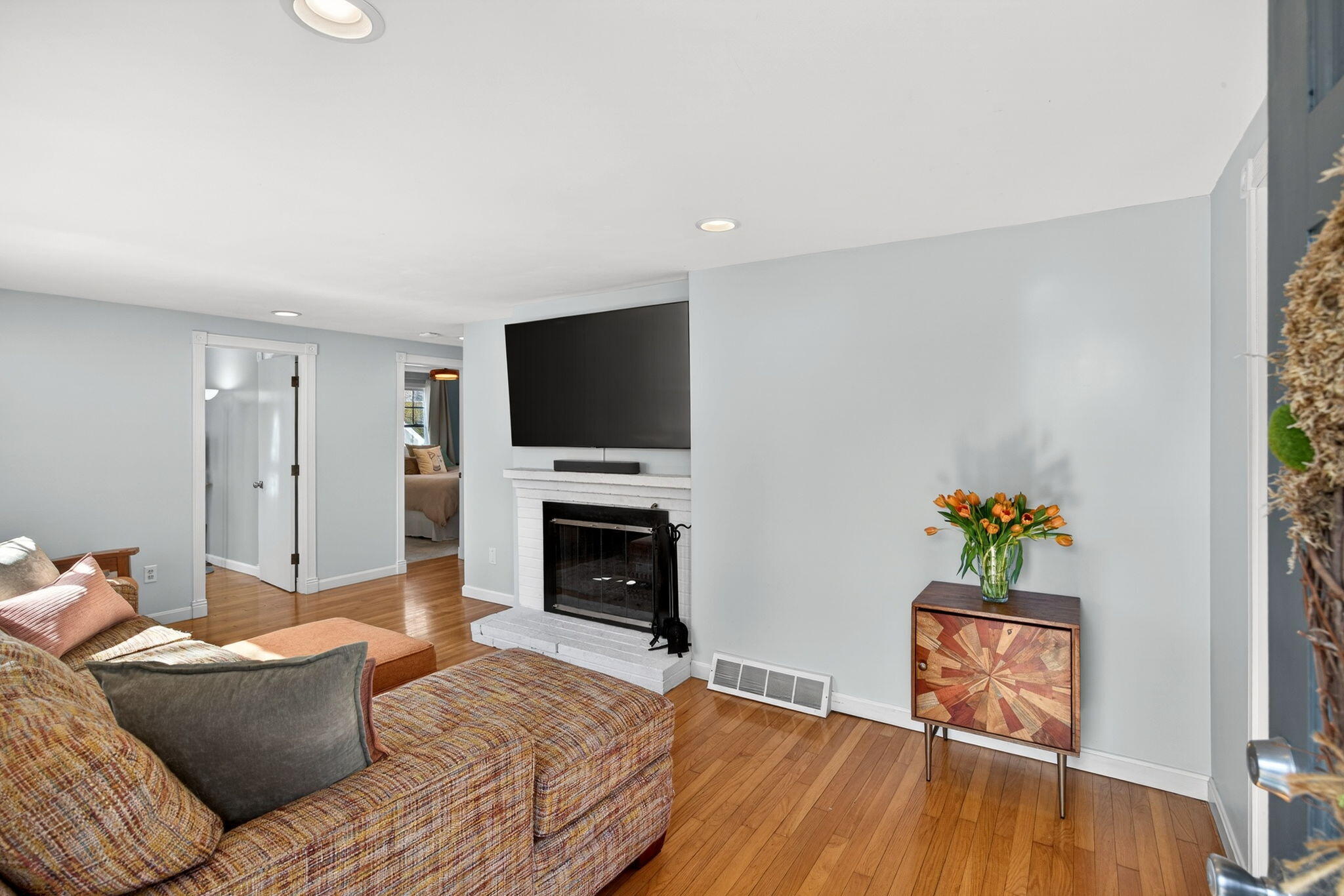 3 Januit Street Sandwich, MA 02563 - Photo 3 of 32 a living room with furniture and a flat screen tv