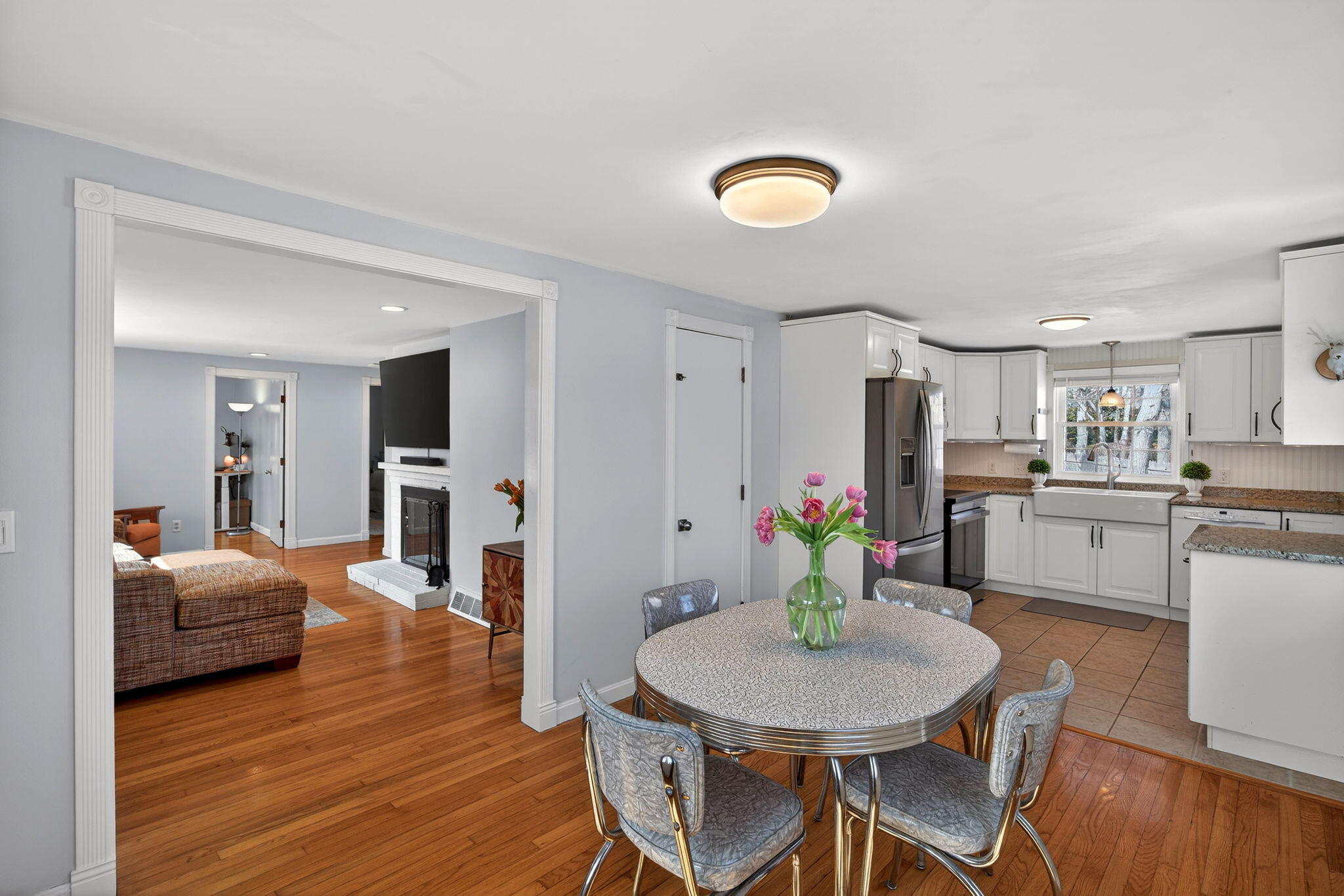 3 Januit Street Sandwich, MA 02563 - Photo 7 of 32 a living room with furniture and kitchen view