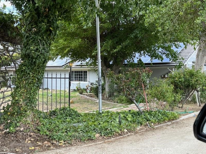 a view of a house with a garden