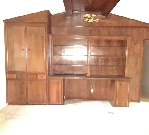 a picture of a bathroom with mirror