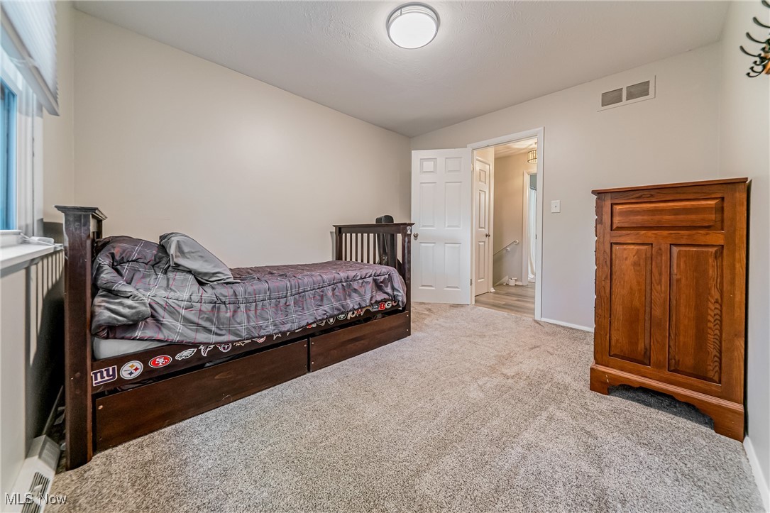 595 Moorfield Road Fairlawn, OH 44313 - Photo 22 of 50 Bedroom with carpet and baseboards
