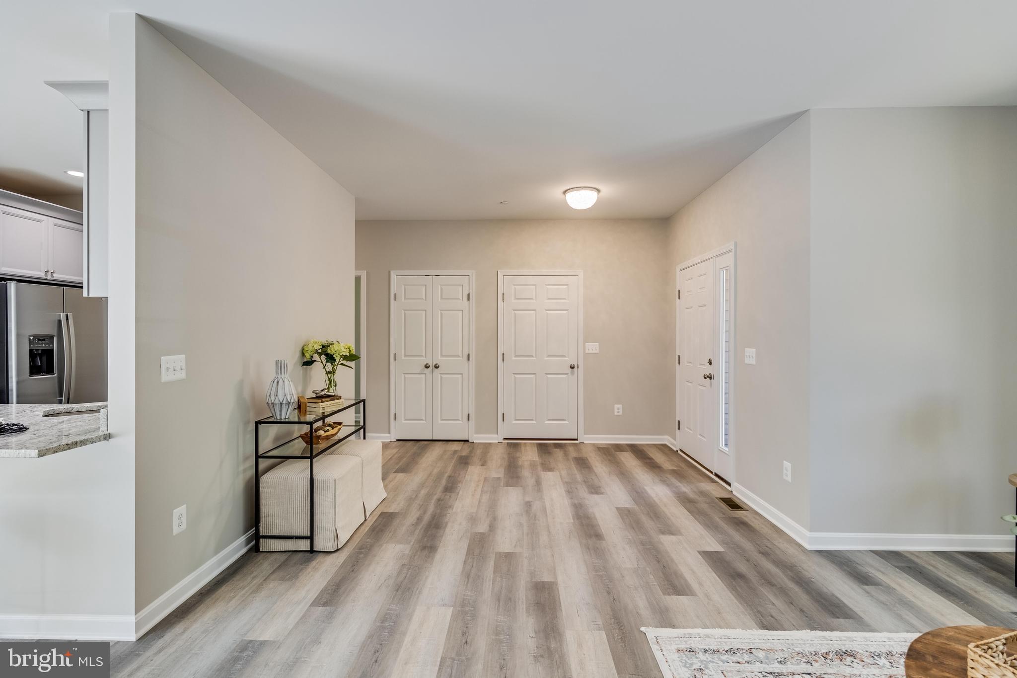 21183 Abell Road Avenue, MD 20609 - Photo 16 of 36 a view of empty room with wooden floor
