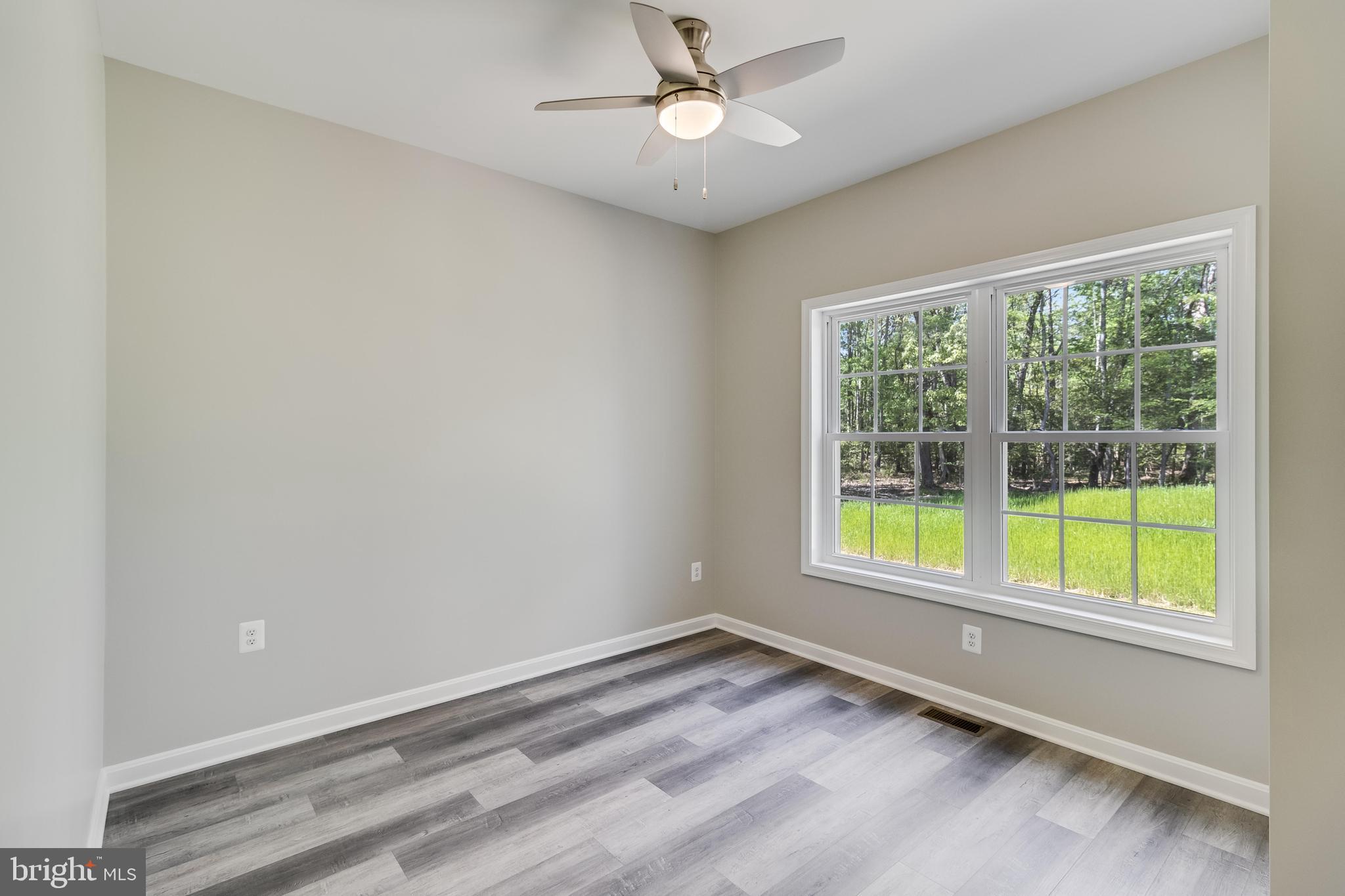 21183 Abell Road Avenue, MD 20609 - Photo 22 of 36 a view of an empty room with a window