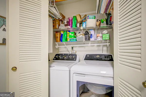 a utility room with dryer and washer