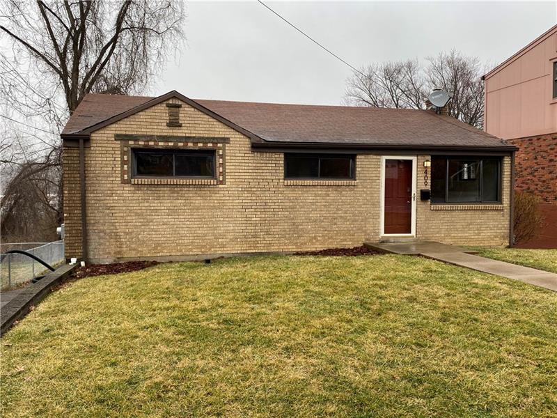 Brick ranch with a desirable level entry!