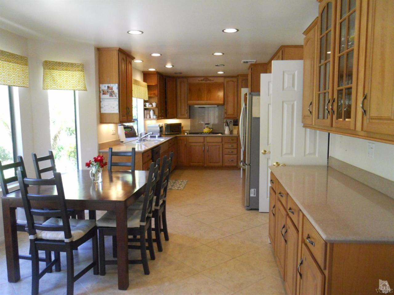 4062 Doneva Road Moorpark, CA 93021 - Photo 8 of 26 a kitchen with a table and chairs