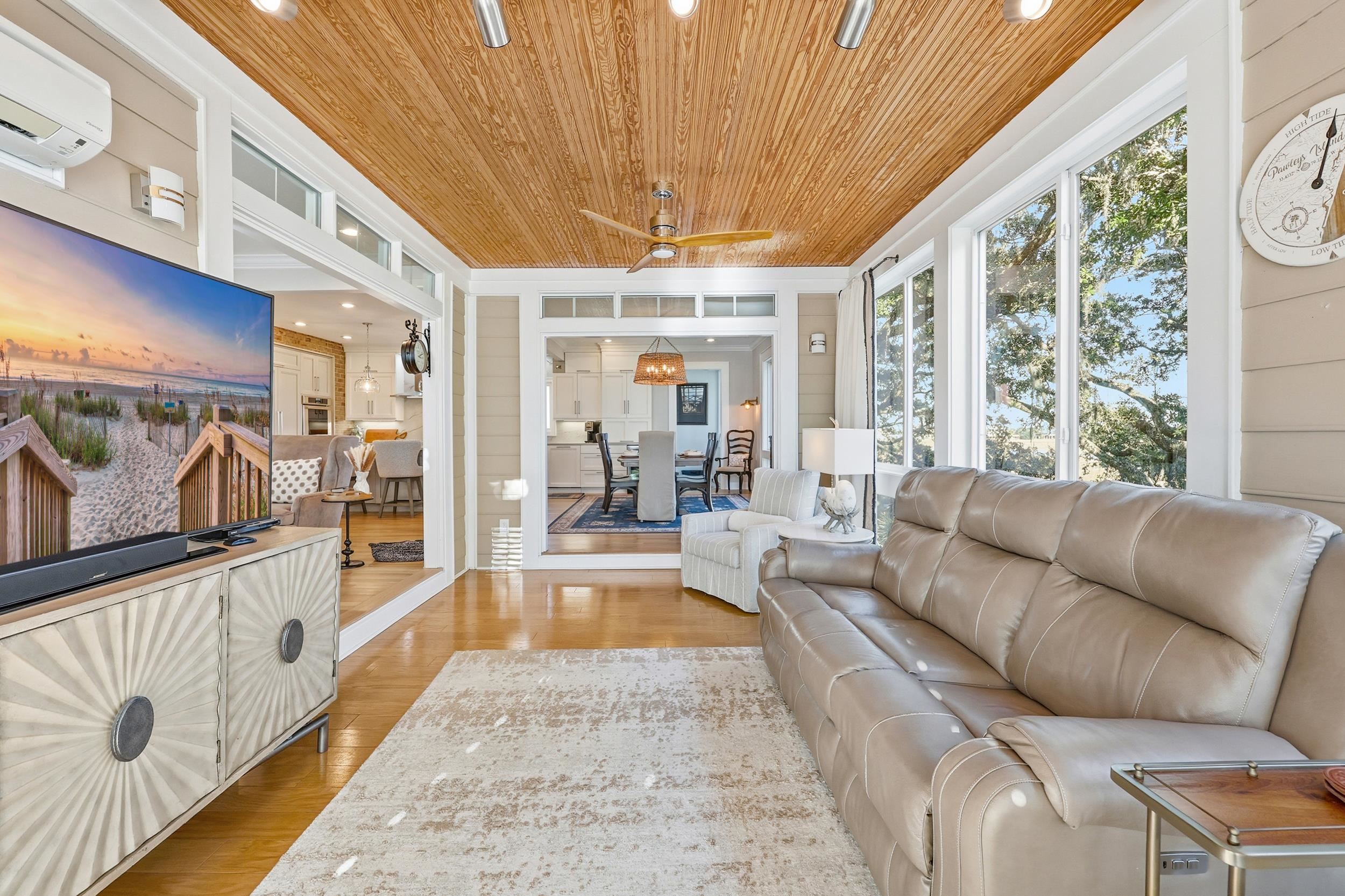 46 High Hammock Way Pawleys Island, SC 29585 - Photo 10 of 40 Sunroom with a wall unit AC