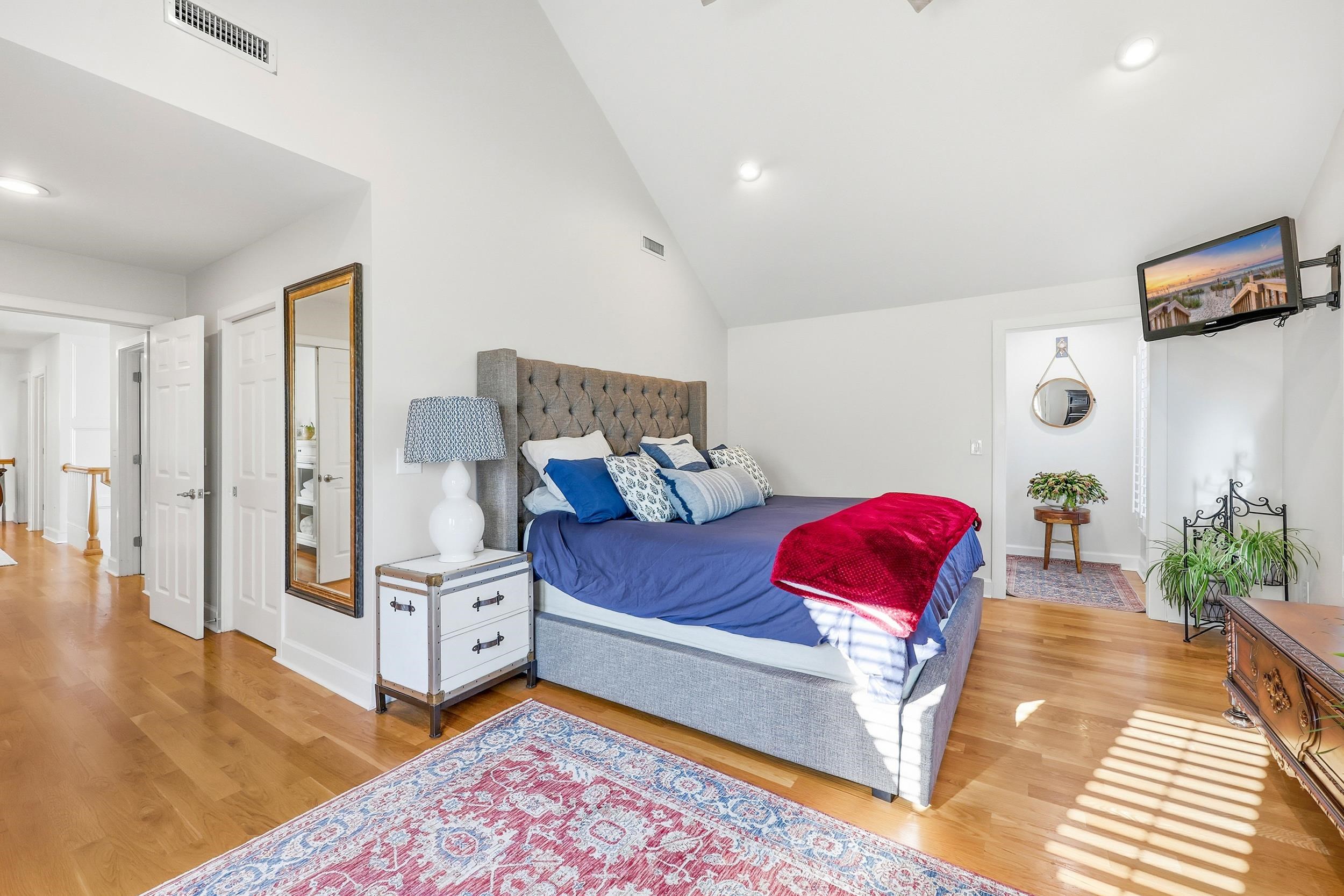46 High Hammock Way Pawleys Island, SC 29585 - Photo 15 of 40 Bedroom featuring light wood-type flooring, vaulted ceiling, and recessed lighting