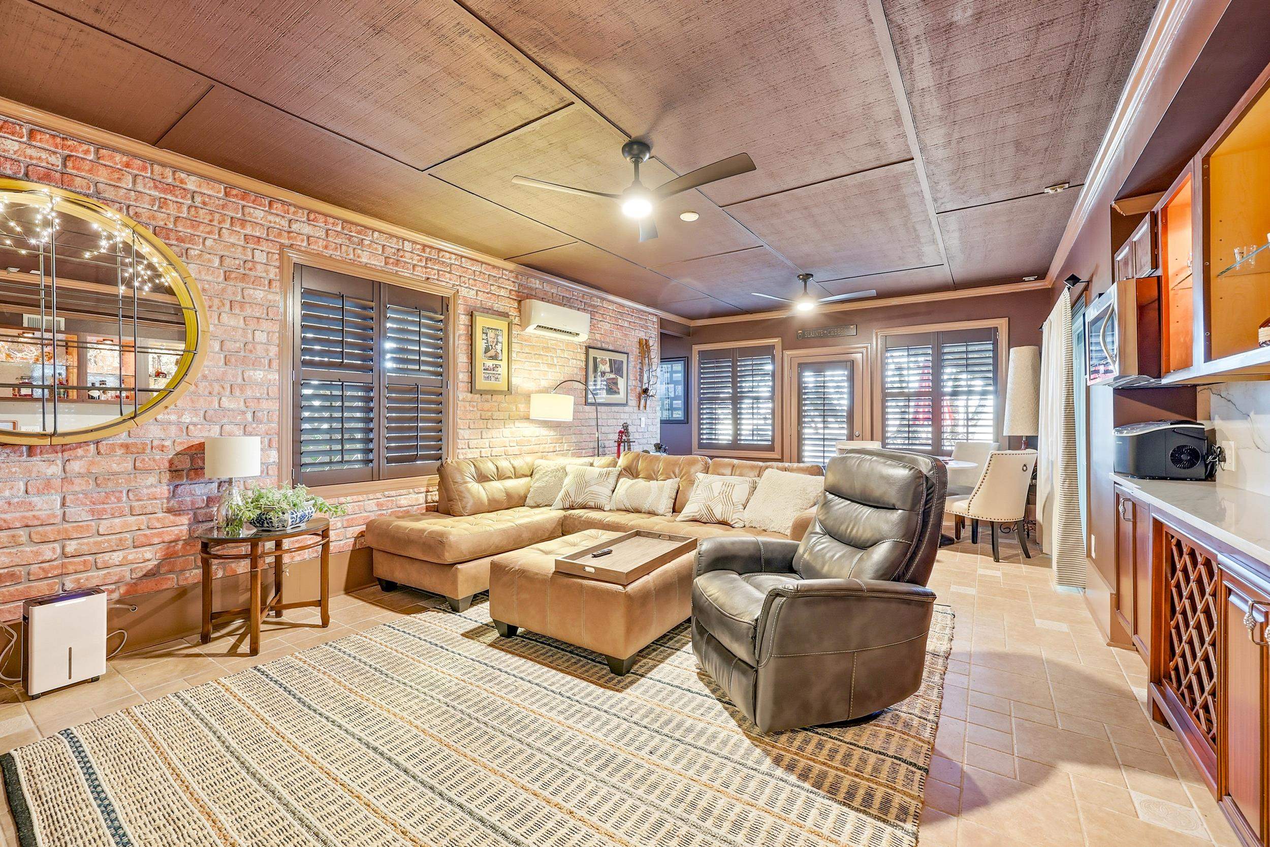 46 High Hammock Way Pawleys Island, SC 29585 - Photo 22 of 40 Living room featuring ceiling fan, crown molding, wooden ceiling, and a wall unit AC