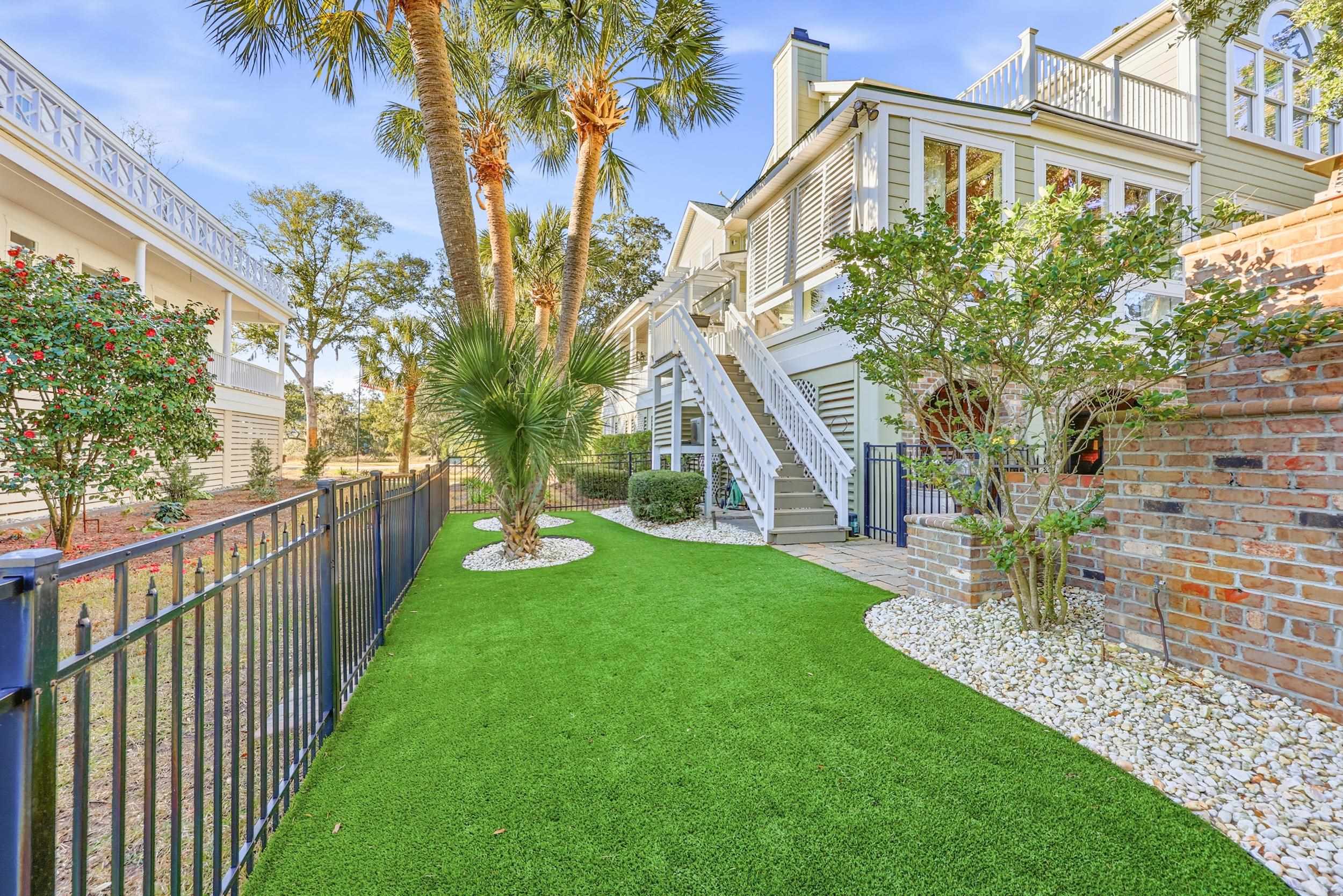 46 High Hammock Way Pawleys Island, SC 29585 - Photo 26 of 40 Fenced backyard featuring stairway