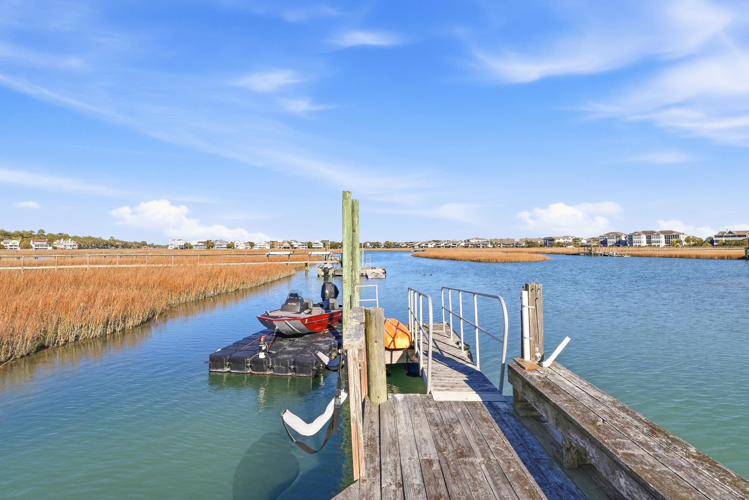 46 High Hammock Way Pawleys Island, SC 29585 - Photo 39 of 40 Dock featuring a water view