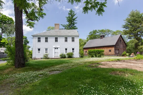 a view of a house with garden