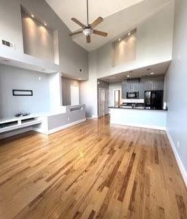 1045 Bonner Street Houston, TX 77007 - Photo 8 of 14 a large kitchen with stainless steel appliances kitchen island granite countertop a sink counter space and cabinets
