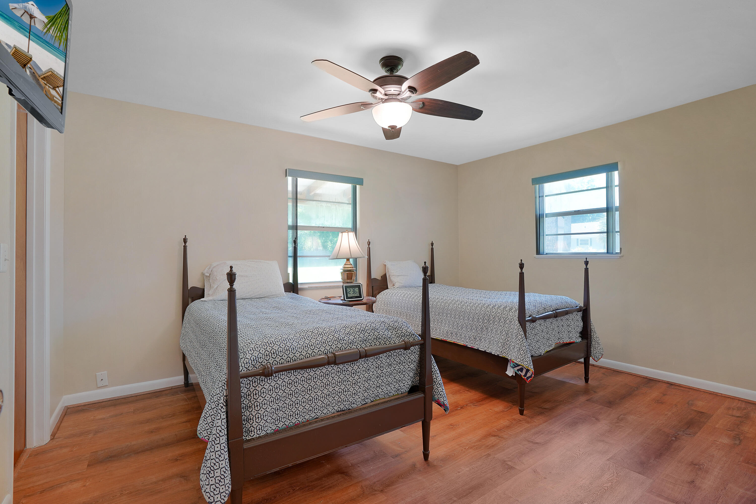 7601 Donlon Road Fort Pierce, FL 34951 - Photo 24 of 32 a bedroom with a bed and a window