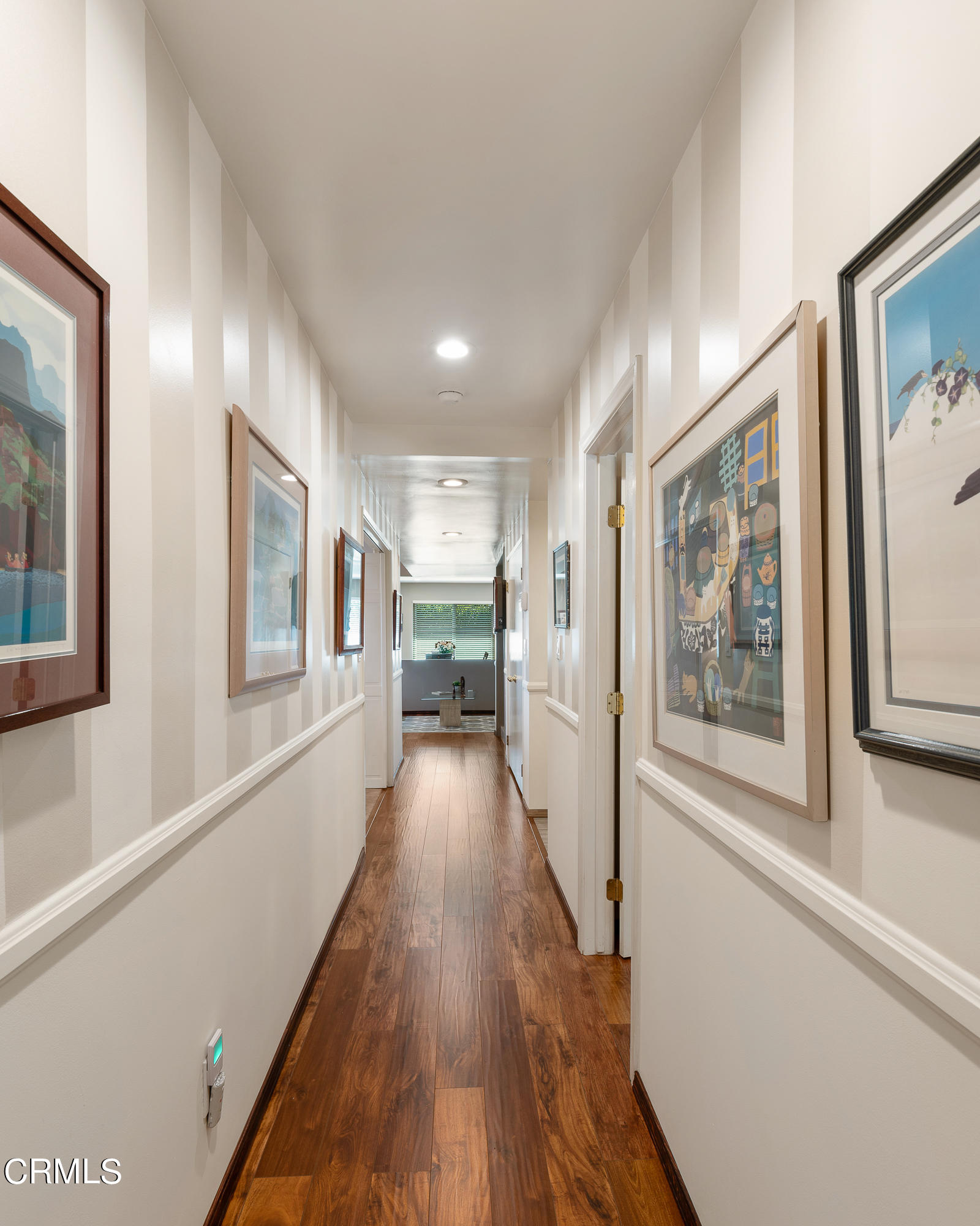 3894 San Augustine Drive Glendale, CA 91206 - Photo 15 of 51 a view of a hallway with wooden floor and windows