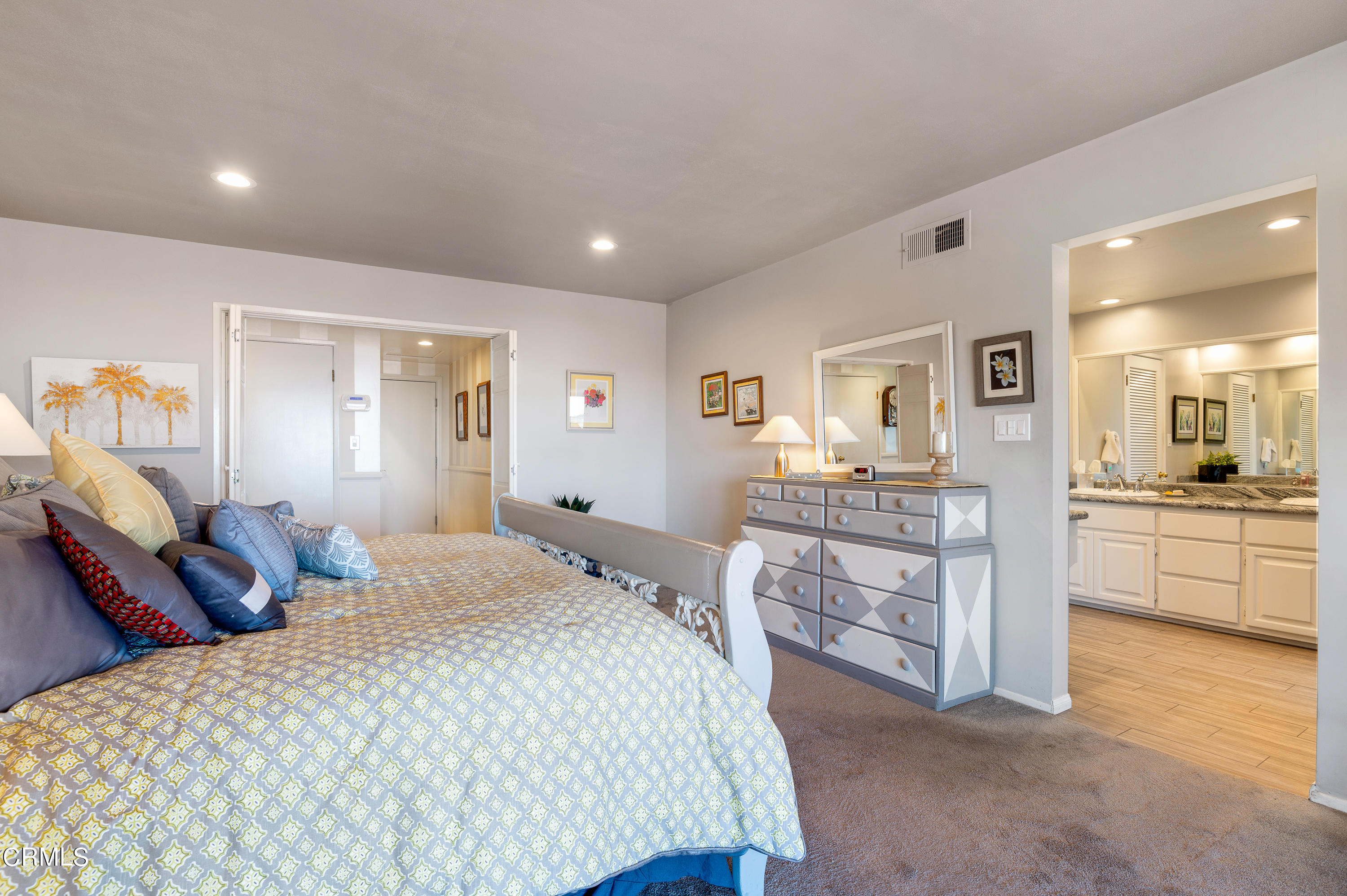 3894 San Augustine Drive Glendale, CA 91206 - Photo 17 of 51 a bedroom with a large bed and a view of kitchen