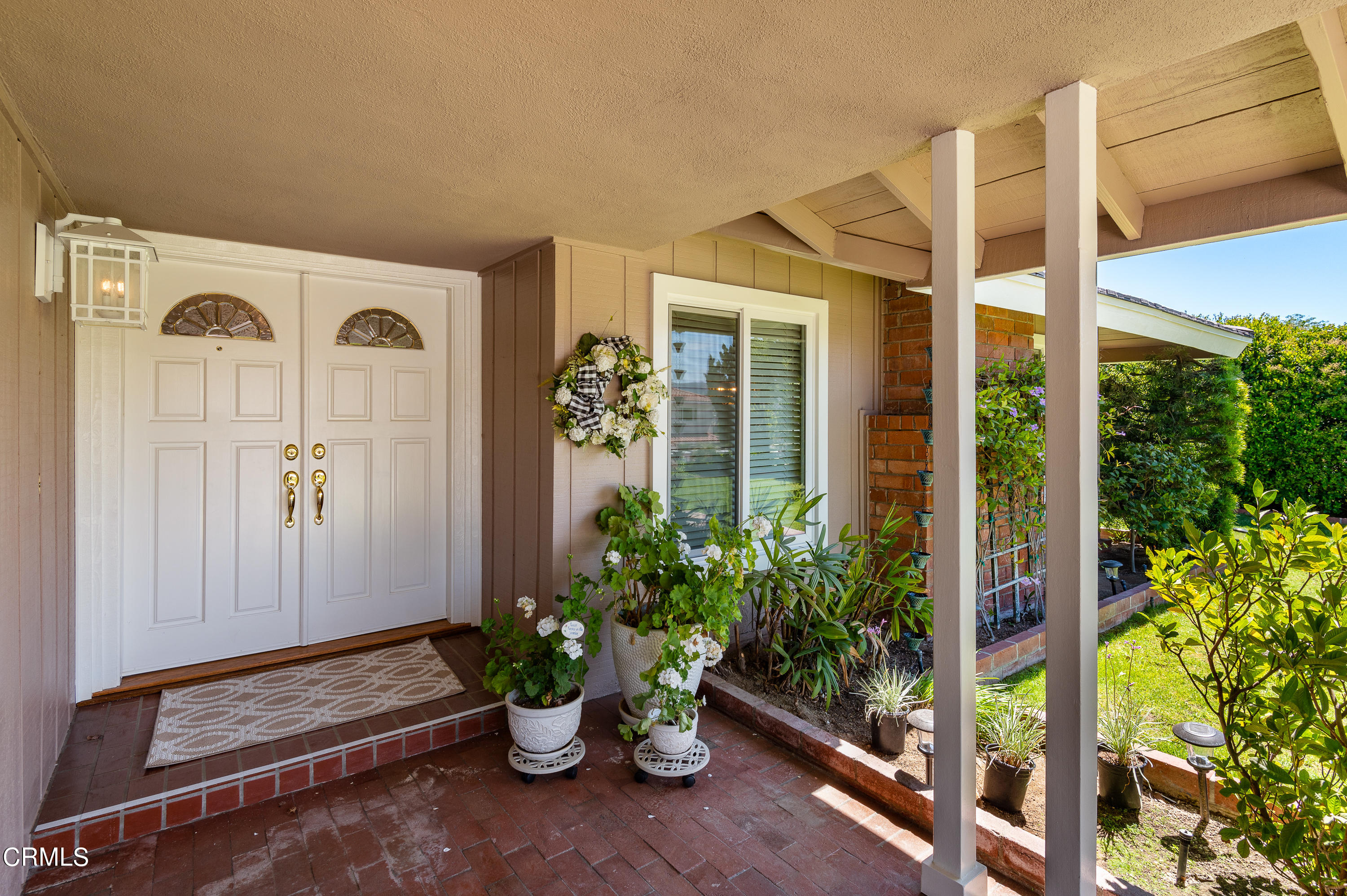 3894 San Augustine Drive Glendale, CA 91206 - Photo 3 of 51 a front view of a house with garden